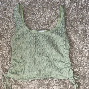 Light green crop top! With ties on the side. Purchased through Lash Next Door.